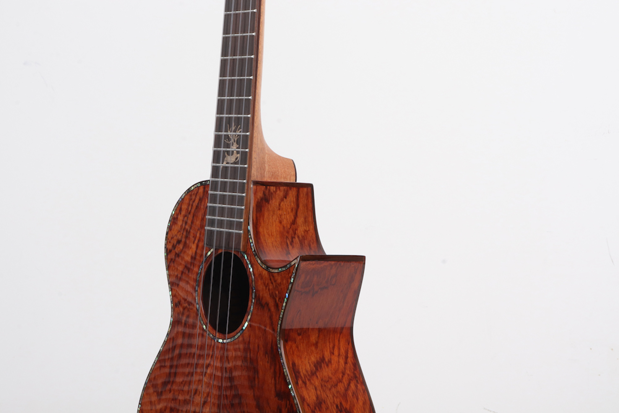 Padauk wood ukulele cutaway